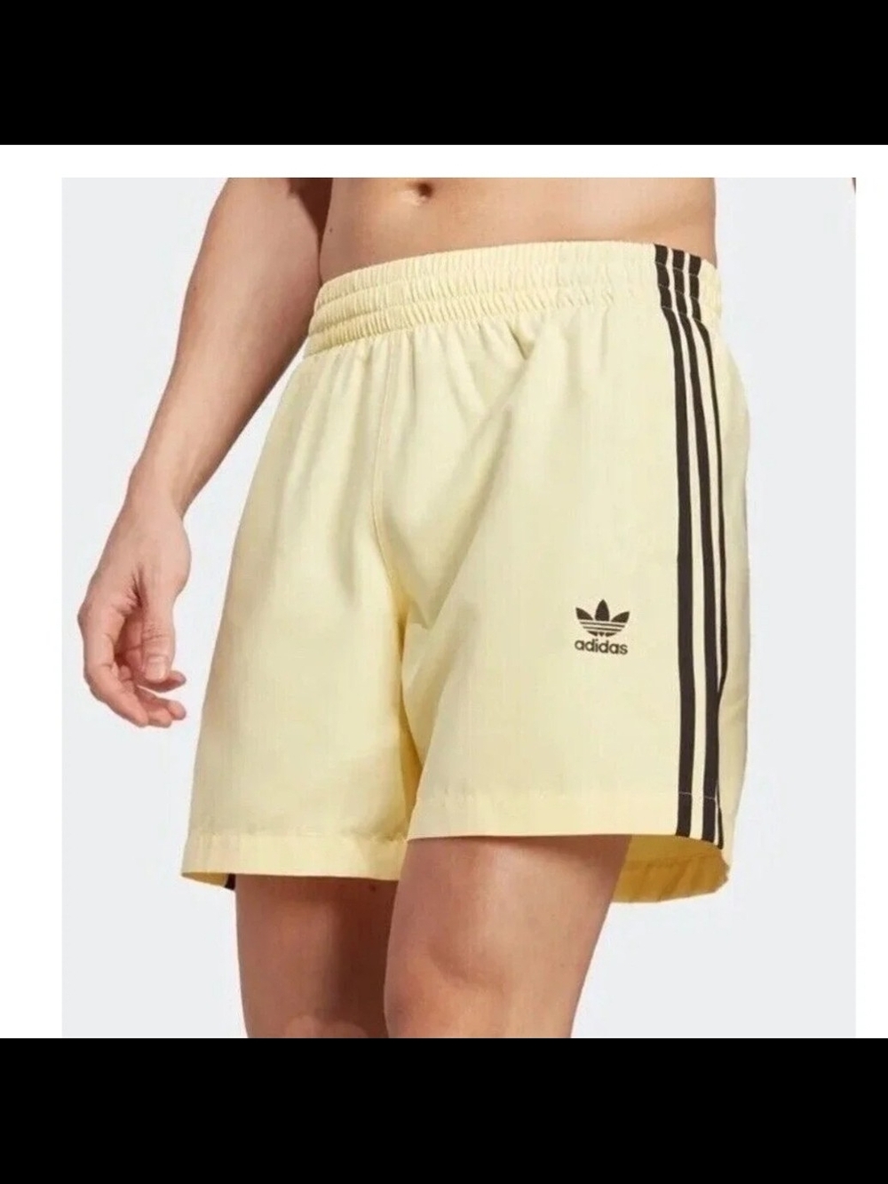 adidas Women’s Pale Yellow 3-Stripes Athletic Shorts